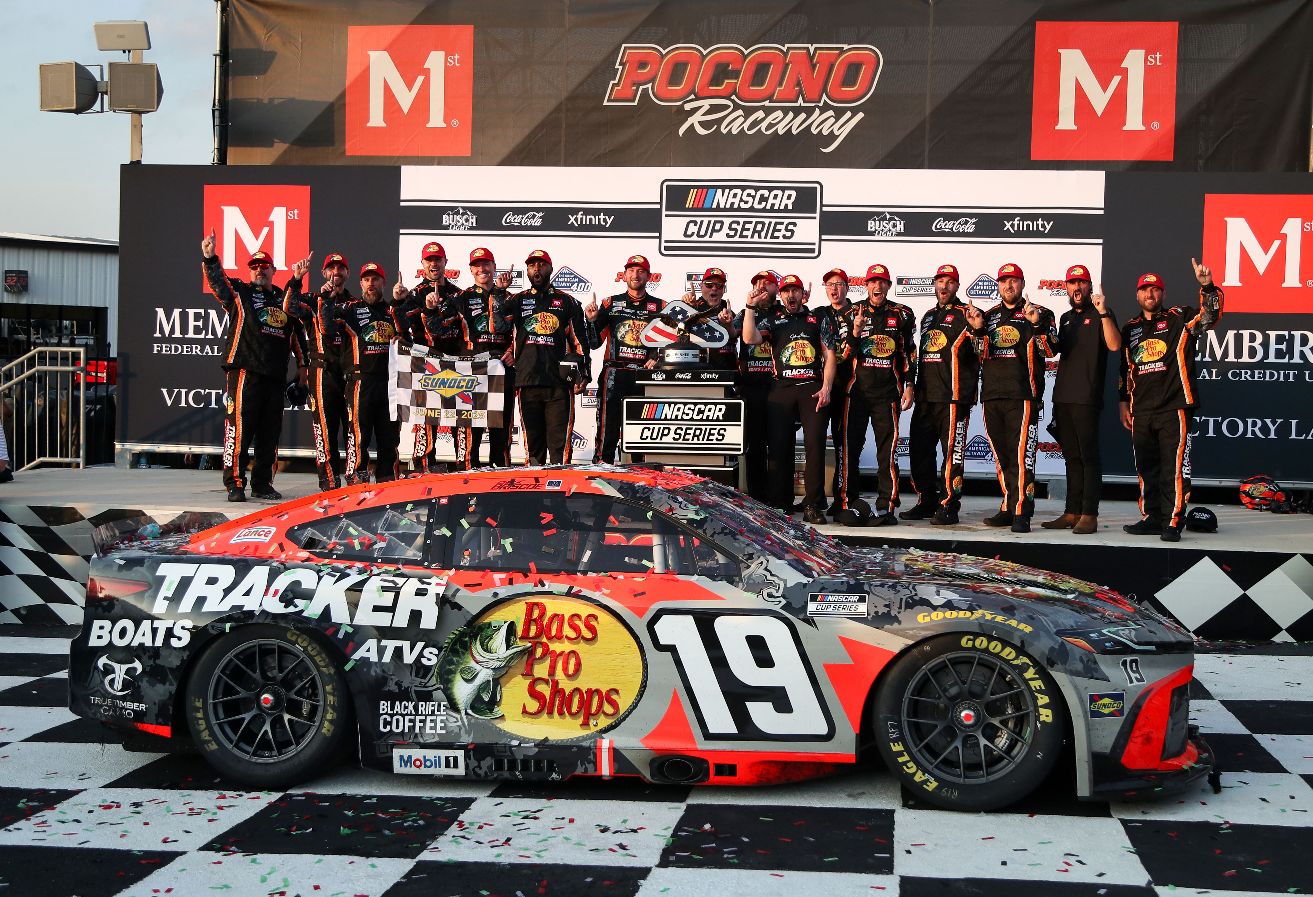 Chase Briscoe celebrates with his team in victory lane after winning The Great American Getaway 400 at Pocono Raceway. - Source: Imagn